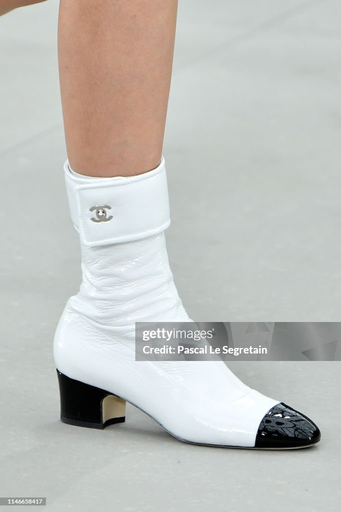 A model,shoe detail, walks the runway during Chanel Cruise 2020... News ...