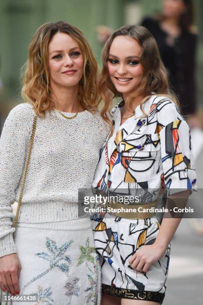 Lily-Rose Depp with her mother Vanessa Paradis attend the Chanel Cruise Collection 2020 : Front Row At Grand Palais on May 03, 2019 in Paris, France.