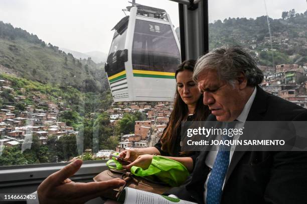 The General Secretary of the Organisation of American States , Luis Almagro, is pictured riding the Metro Cable during a preparation visit ahead of...