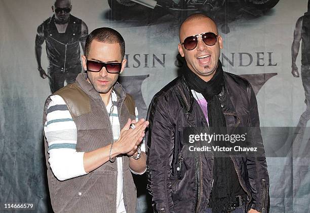 Llandel Veguilla and Juan Luis Morera of Wisin Y Yandel attend a photocall to promote their new album "Los Vaqueros El Regreso Deluxe Edition" at...