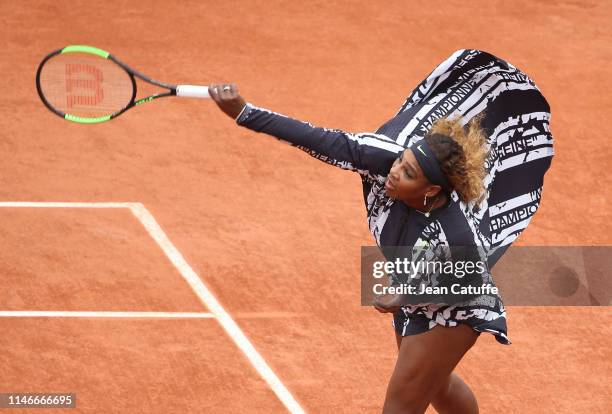 Serena Williams of USA wears a special Nike jacket - with French text reading 'Champion, Championne', 'Queen, Reine', 'Goddess, Deesse' and 'Mother,...