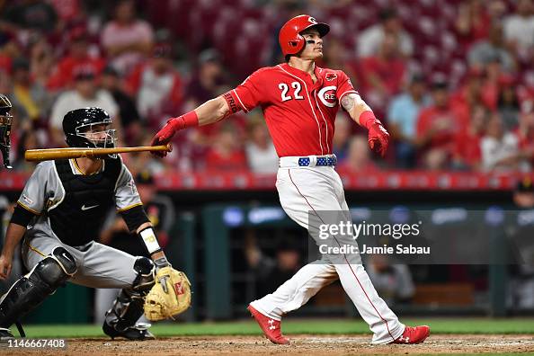Derek Dietrich of the Cincinnati Reds watches his home run in the