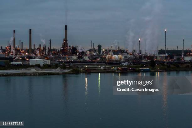 oil refinery, st. clair river, sarnia, ontario, canada - carbon cycle stock pictures, royalty-free photos & images