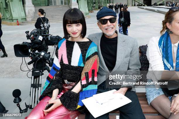 Nana Komatsu and Jean-Paul Goude attend the Chanel Cruise Collection 2020 : Front Row at Le Grand Palais on May 03, 2019 in Paris, France.