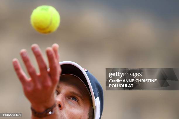 Italy's Andreas Seppi serves the ball to Italy's Fabio Fognini during their men's singles first round match on day three of The Roland Garros 2019...