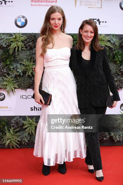 Pheline Roggan and Lavinia Wilson attend the Lola - German Film Award red carpet at Palais am Funkturm on May 03, 2019 in Berlin, Germany.