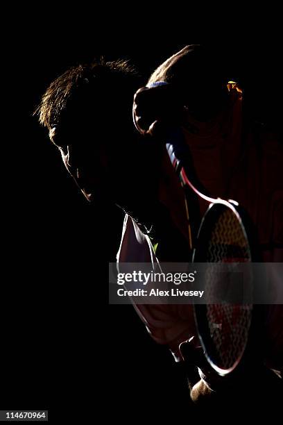 Jarko Nieminen of Finland serves during the men's doubles round one match between Ashley Fisher and Stephen Huss of Australia and Johan Brunstrom of...