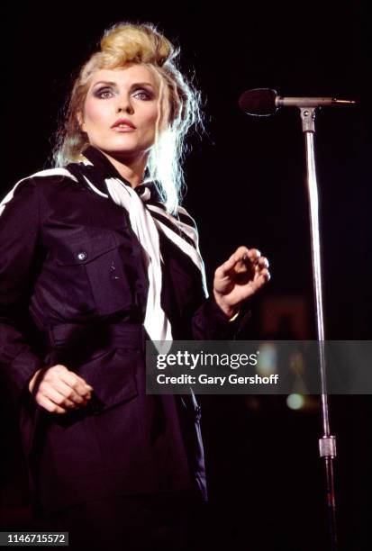 American New Wave musician Debbie Harry, of the group Blondie, performs onstage at Byrne Arena, East Rutherford, New Jersey, August 14, 1982.