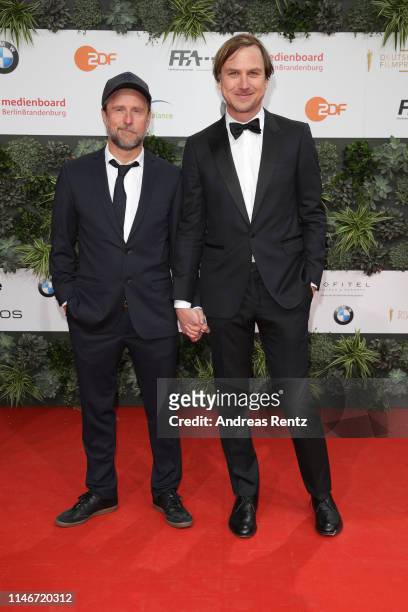 Bjarne Mädel and Lars Eidinger attend the Lola - German Film Award red carpet at Palais am Funkturm on May 03, 2019 in Berlin, Germany.