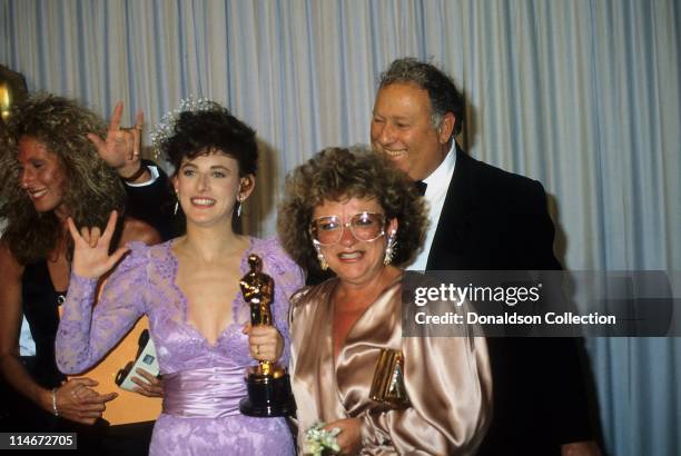 Actress Marlee Matlin and her mother at Academy Awards with Best Actress Trophy in March 30, 1987 in Los Angeles, California.