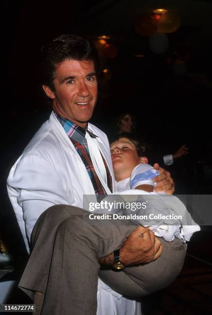 Actor Alan Thicke and son Robin Thicke attend the opening of singer Olivia Newton-John's new boutique Koala Blue in the Westside Pavilion Mall in...