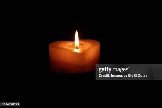 heart candle - mourning stock pictures, royalty-free photos & images