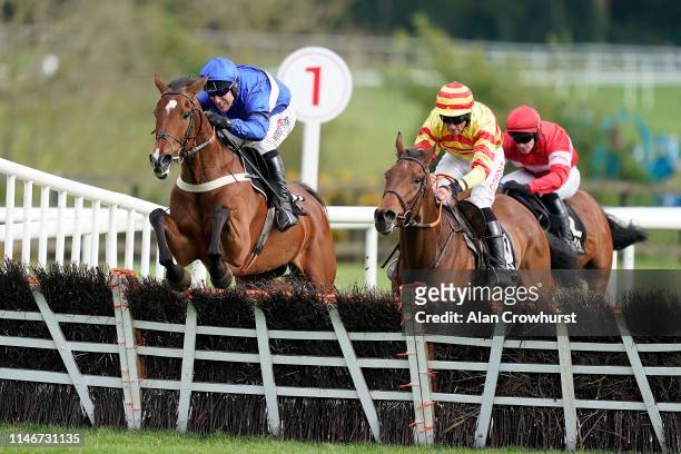 Robbie Power riding Reserve Tank clear the last to win The Alanna Homes Champion Novice Hurdle at Punchestown Racecourse on May 03, 2019 in Naas,...