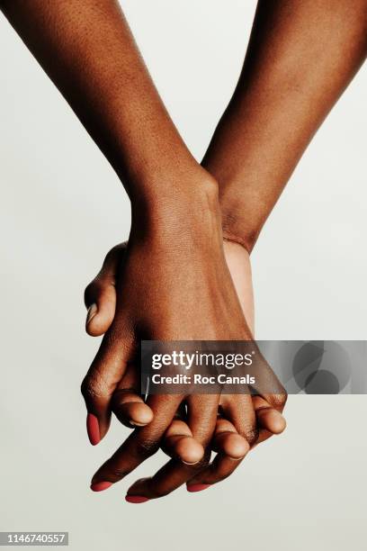 united blacks - gripping stock pictures, royalty-free photos & images