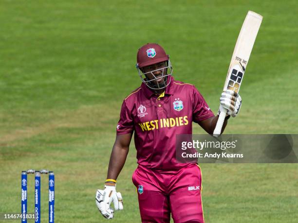Andre Russell of West Indies acknowledges the applause on reaching his half-century during the ICC Cricket World Cup 2019 Warm Up match between West...