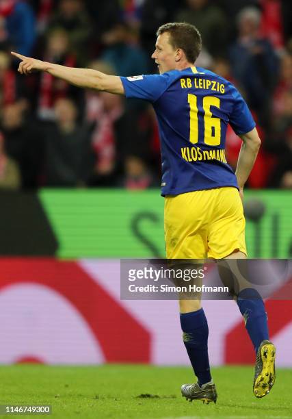 Lukas Klostermann of RB Leipzig celebrates after he scores his sides second goal during the Bundesliga match between 1. FSV Mainz 05 and RB Leipzig...