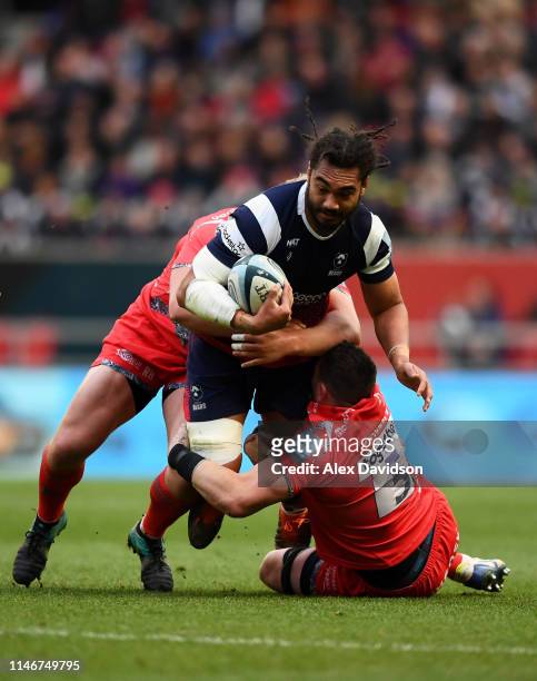 Chris Vui of Bristol Bears is tackled by James Phillips and A J MacGinty of Sale Sharks during the Gallagher Premiership Rugby match between Bristol...