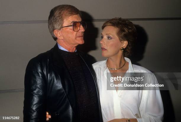 Director Blake Edwards and wife actress Julie Andrews pose for a portrait in circa 1985 in Los Angeles, California.