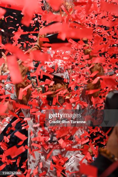 Kyle Lowry of the Toronto Raptors celebrates after defeating the Milwaukee Bucks during Game Six of the Eastern Conference Finals on May 25, 2019 at...