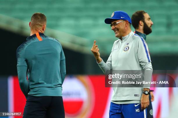 Maurizio Sarri the head coach / manager of Chelsea gestures towards Ross Barkley of Chelsea during the Chelsea training session prior to the UEFA...