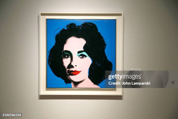 An art piece named " Liz" by Andy Warhol is displayed during the unveiling of highlights from "20th Century Week" at Christie's on May 03, 2019 in...