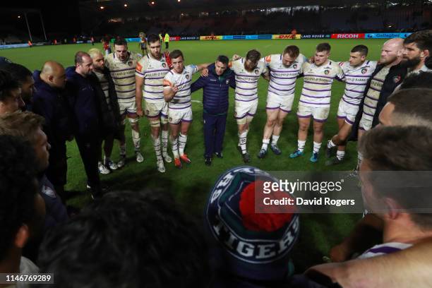 George Ford of Leicester Tigers talks to team mates as they huddle after the Gallagher Premiership Rugby match between Harlequins and Leicester...