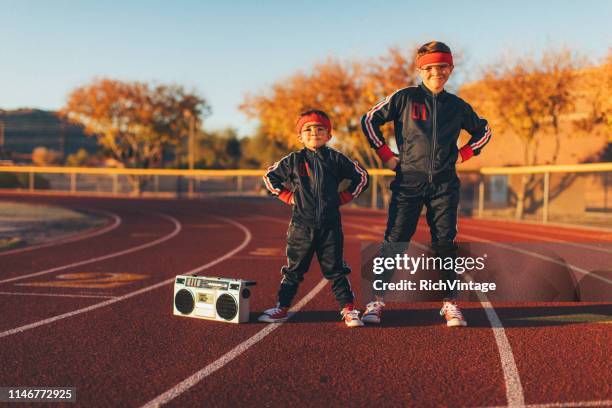 young nerd boys en track - chándal fotografías e imágenes de stock