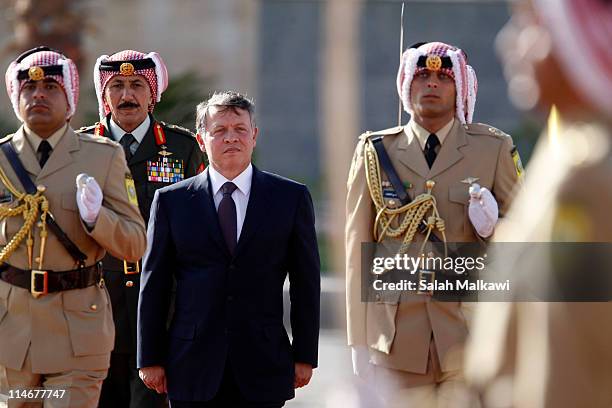 King Abdullah II of Jordan arrives at an official celebration for the 65th anniversary of Independence, on May 25, 2011 in Amman, Jordan. The...