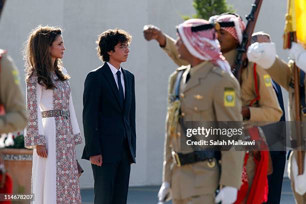 Queen Rania of Jordan and her son Crown Prince Hussein arrive at an official celebration for the 65th anniversary of Independence on May 25, 2011 in...