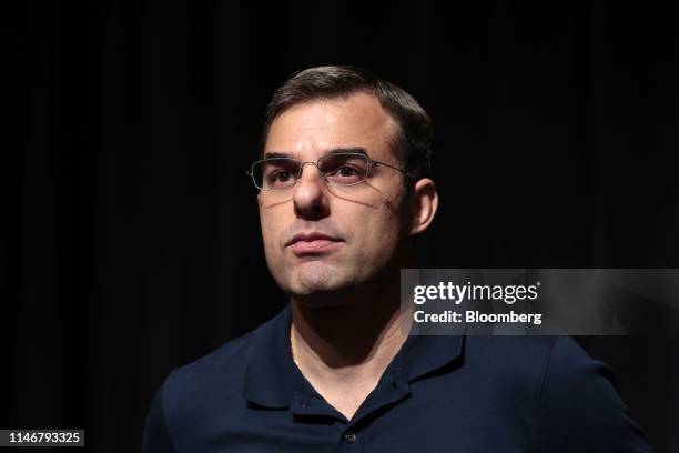 Representative Justin Amash, a Republican from Michigan, listens as he is introduced during a town hall event in Grand Rapids, Michigan, U.S., on...