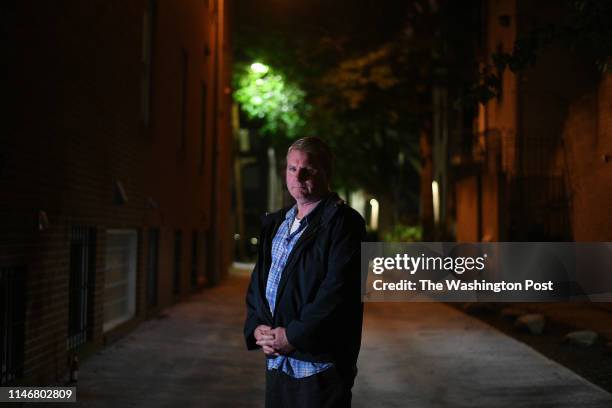 Advisory Neighborhood Commissioner John Fanning stands in an alley which he says is used by sex workers and their customers in their cars in the...