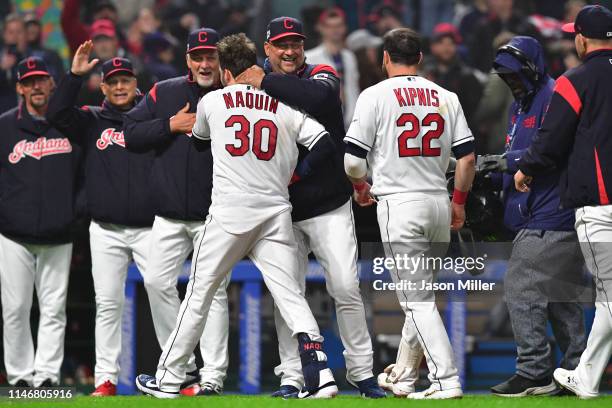 Manager Terry Francona celebrates with Tyler Naquin of the Cleveland Indians after Naquin hit a walk-off single during the ninth inning against the...