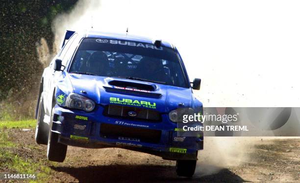 Tommi Makinen of Finland and his co-driver Kaj Lindstrom run wide and get airborne while negotiating a fast left hander in their Subaru Impreza...