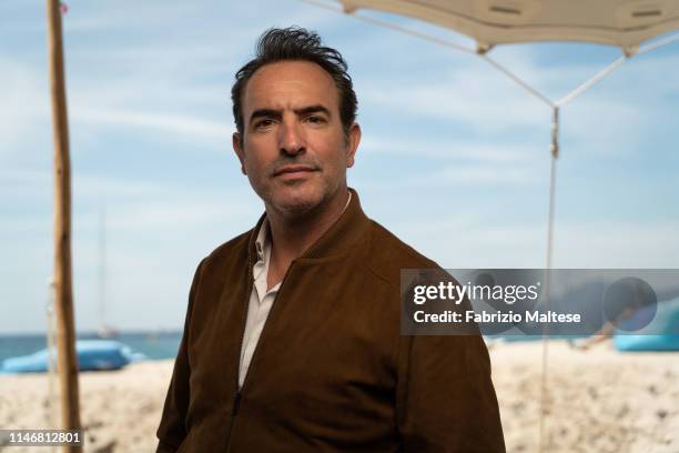 Actor Jean Dujardin poses for a portrait on May 16, 2019 in Cannes, France.