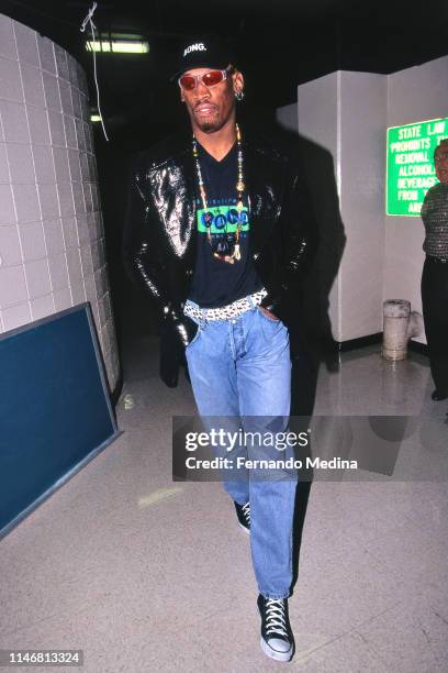 Dennis Rodman of the Chicago Bulls arrives prior to a game against the Charlotte Hornets before Game Four of the Eastern Conference Semifinals of the...