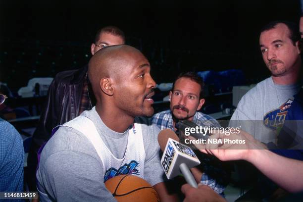 Bryon Russell of the Utah Jazz speaks to the media during media availability as part of the 1998 NBA Finals at the Delta Center in Salt Lake City,...