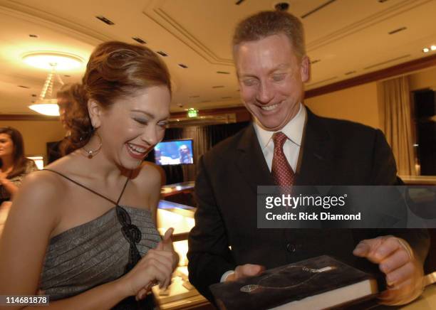 Diana DeGarmo viewing "The Voile Pendant" shown by Tom Carroll-VP Tiffany & Co.
