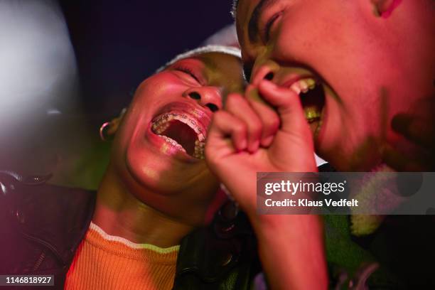 cheerful couple enjoying movie - theatre audience stock pictures, royalty-free photos & images