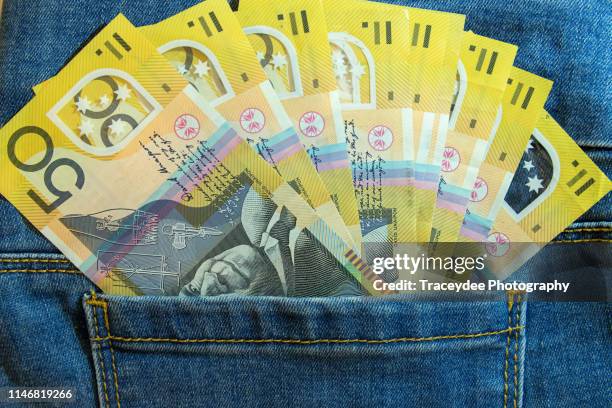 australian currency in pocket - australian economy stock pictures, royalty-free photos & images