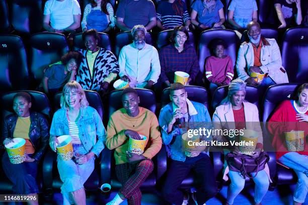 audience enjoying comedy movie - movie theater imagens e fotografias de stock