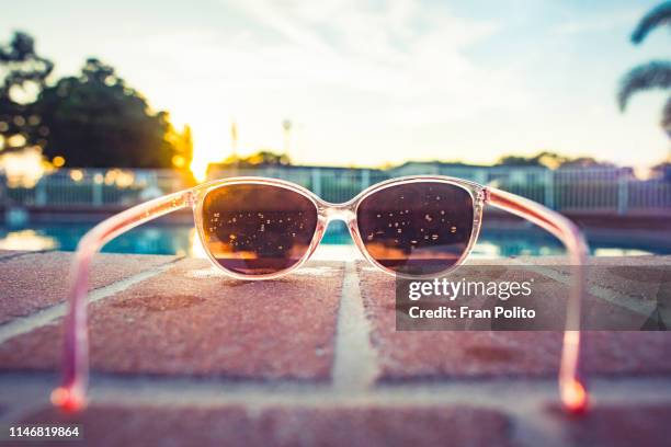 sunglasses in the sun. - pink sunglasses stock pictures, royalty-free photos & images