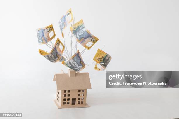 saving money for property investment in australia - home loans stock pictures, royalty-free photos & images