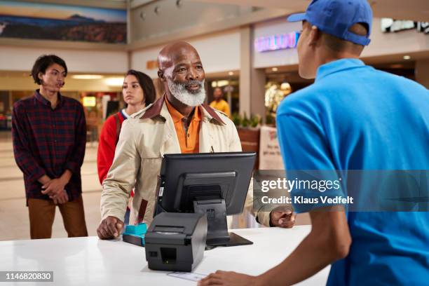 Taking Tickets 287 Theatre Ticket Counter Stock Photos, High-Res Pictures, and Images ...