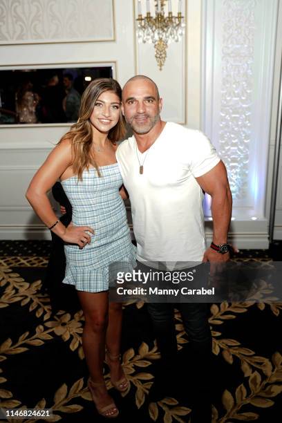 Gia Giudice and Joe Gorga attend the Envy By Melissa Gorga Fashion Show on May 03, 2019 in Hawthorne, New Jersey.