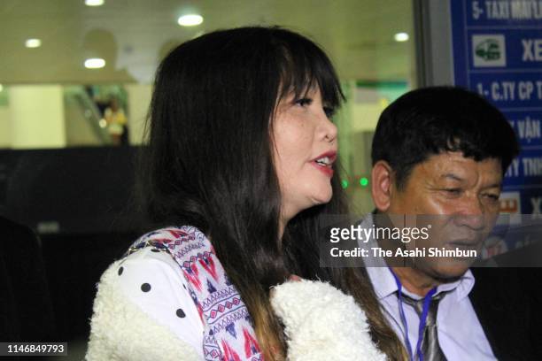 Doan Thi Huong speaks to media reporters on arrival at Hanoi International Airport on May 3, 2019 in Hanoi, Vietnam. Doan Thi Huong from Vietnam had...