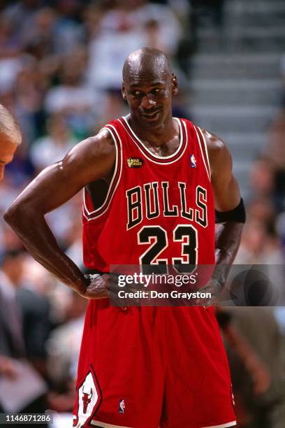 Michael Jordan of the Chicago Bulls looks on during the game against the Utah Jazz in Game One of the NBA Finals during the 1998 NBA Playoffs on June...