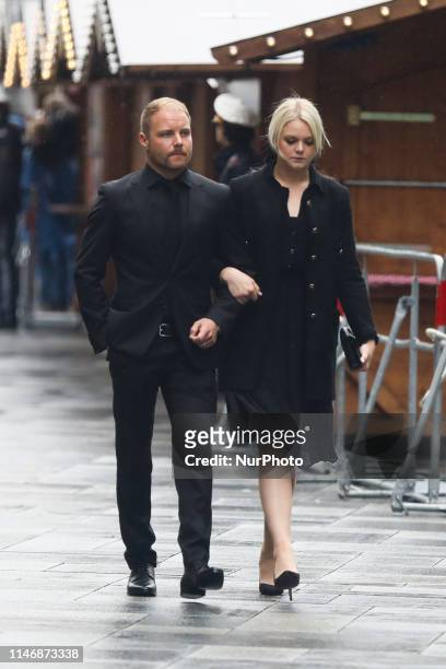 Valtteri Bottas with his partner Emilia Pikkarainen arrive at Niki Lauda's funeral ceremony at St Stephen's cathedral. Vienna, Austria on 29 May....