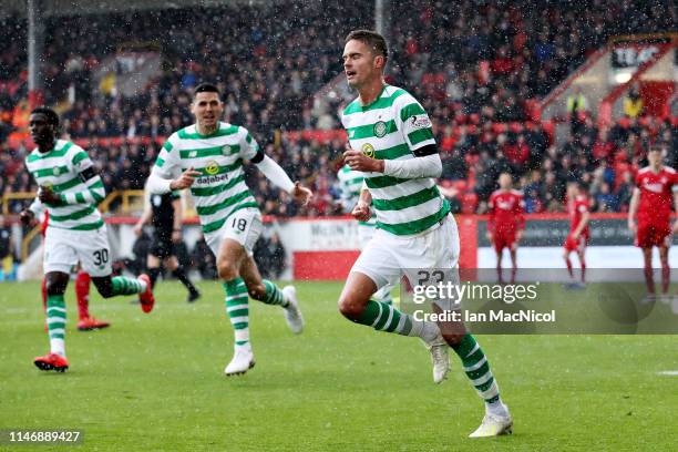 Mikael Lustig of Celtic celebrates scoring the opening goal during the Ladbrokes Scottish Premiership match between Aberdeen and Celtic at Pittodrie...