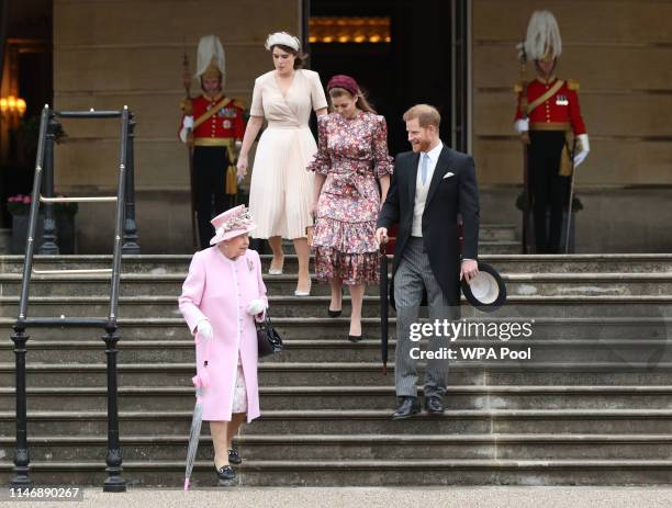 Queen Elizabeth II, Prince Harry, Duke of Sussex, Princess Eugenie and Princess Beatrice attend the Royal Garden Party at Buckingham Palace on May...