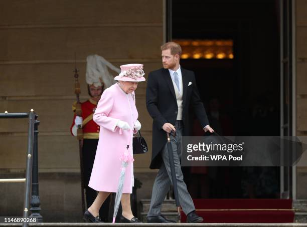 Queen Elizabeth II and Prince Harry, Duke of Sussex attend the Royal Garden Party at Buckingham Palace on May 29, 2019 in London, England.